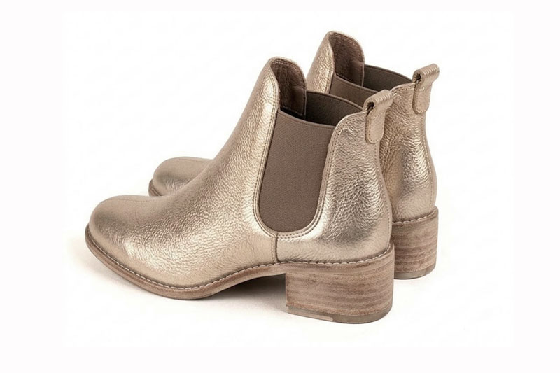 Women's gold and bronze solid-color chelsea boots with round toe and leather sole - Rear view